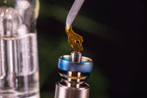 Dabbing tool with small piece of cannabis oil aka shatter